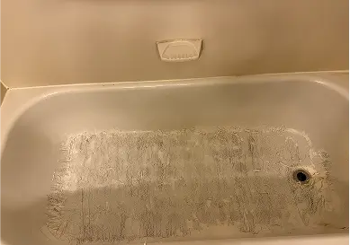 Before Professional bathtub refinishing showing bright and like-new appearance