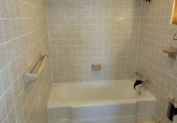 Before tile refinishing showing restored shine and smooth surface